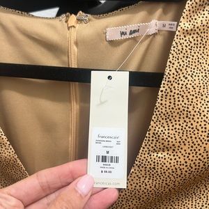 Francesca’s gold silk dress